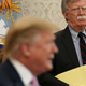 National Security Adviser John Bolton listens to U.S. President Donald Trump speak during a meeting with Egyptian President Abdel-Fattah el-Sisi in the Oval Office of the White House April 9, 2019 in Washington, DC.